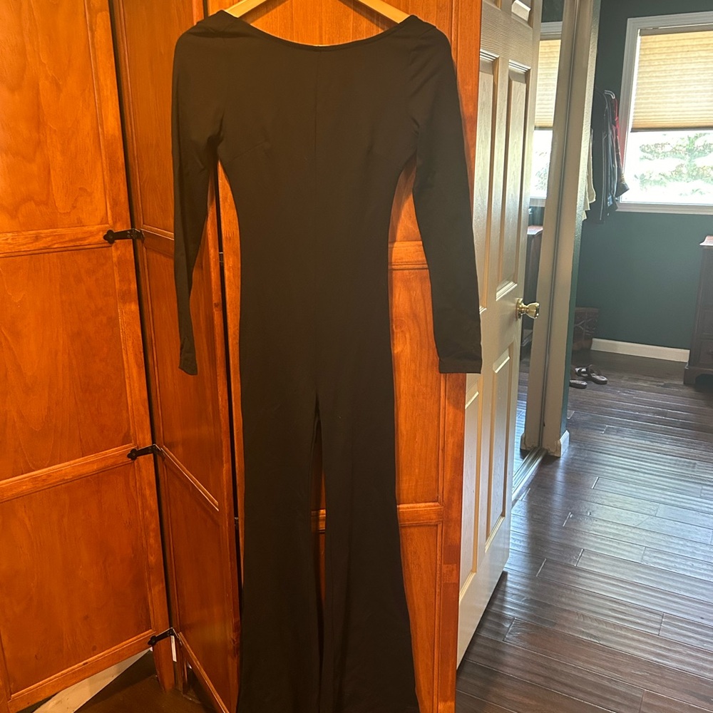 NWT backless one piece! Stunning